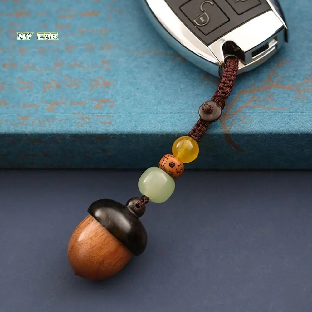 

Pill Hand-woven Decoration Sandalwood Key Keychain Chinese Style Pendant Pinecone Shape Keychain Openable Cover Box Pendant