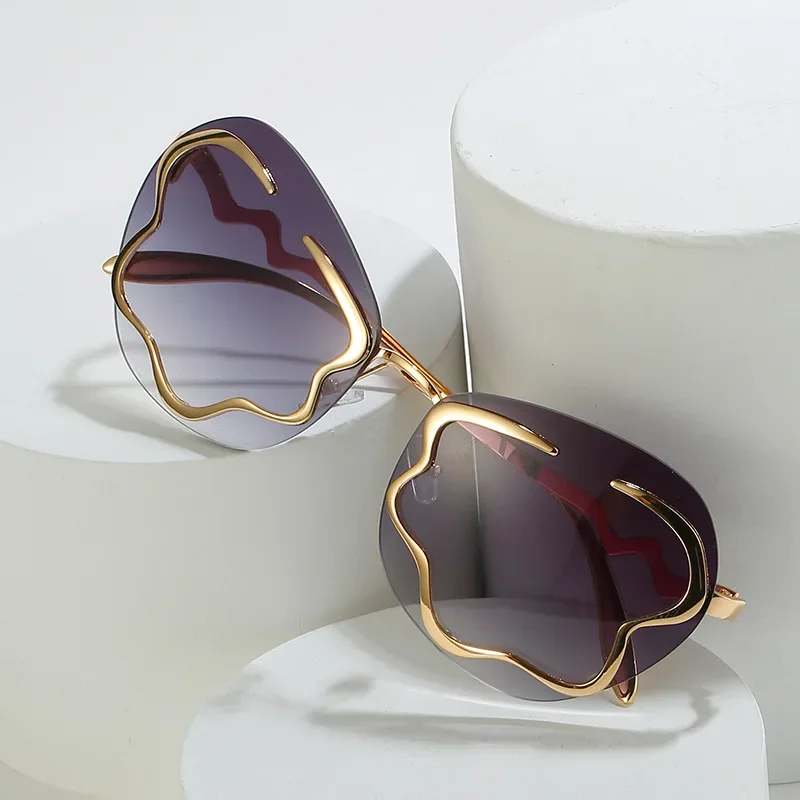 Gafas de sol clásicas de gran tamaño sin montura para hombre y mujer, lentes de sol redondas con flores, lentes oceánicas de moda, UV400