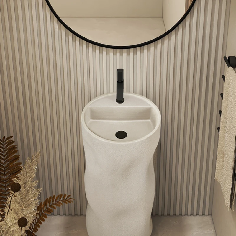 Japanese designer's column basin floor-standing integrated artistic hand-washing basin personality creative