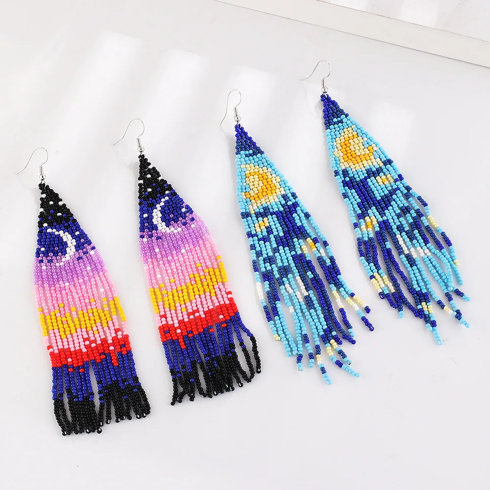 

Beaded earrings Tassel Originality Design Tide Simple Hand knitting Moon Symmetry Bohemia Alloy Rice bead earrings