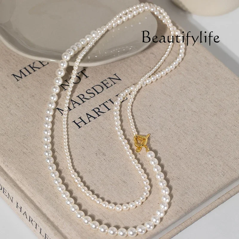 

A variety of ways to wear long white crystal pearl necklace new Chinese sweater chain stacked retro style