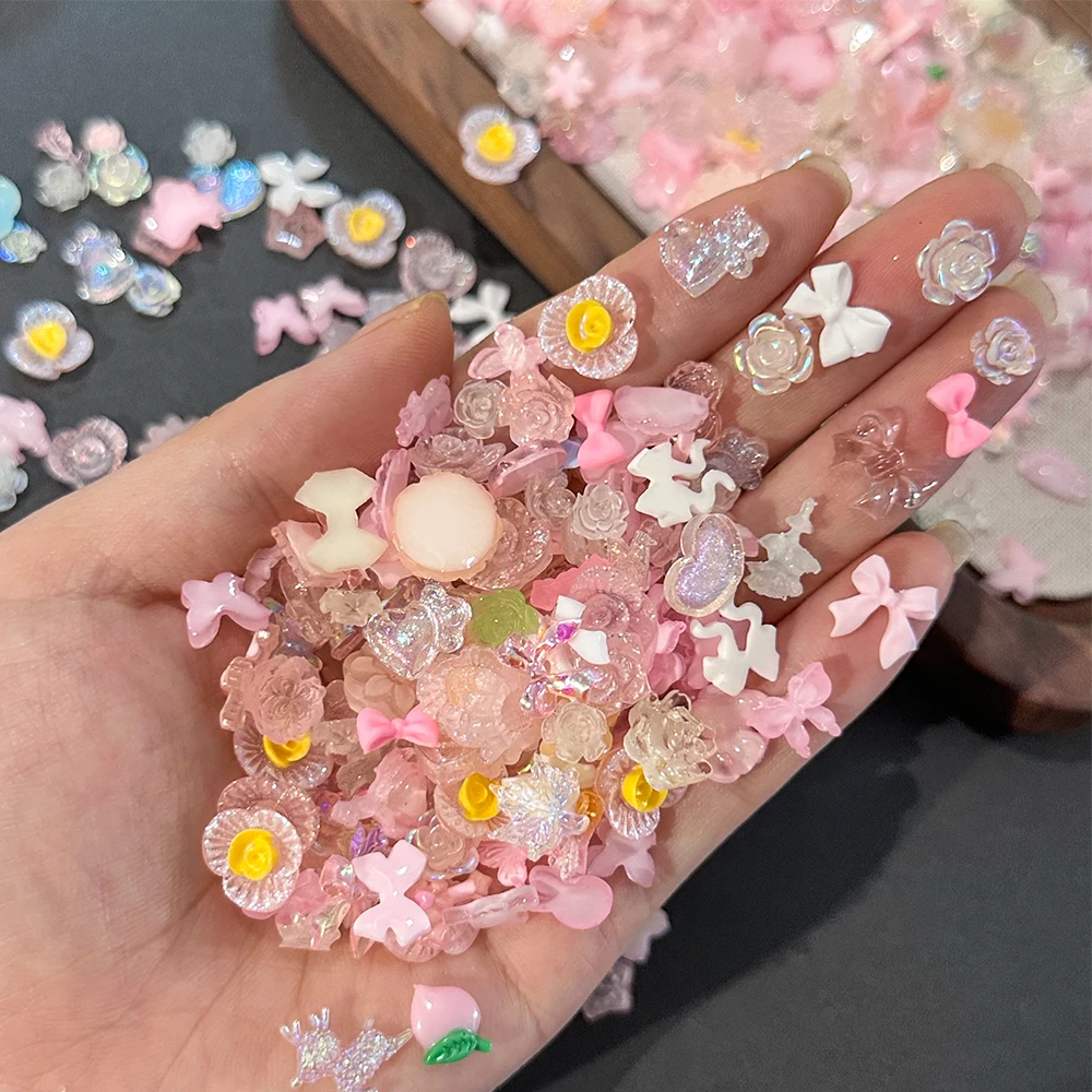 

50g/bag Mixed Style Bowknot Flower Nail Charms 3D Kawaii Resin Camellia Star Sparkling Nail Rhinestone Bowknot Nail Art Decorati