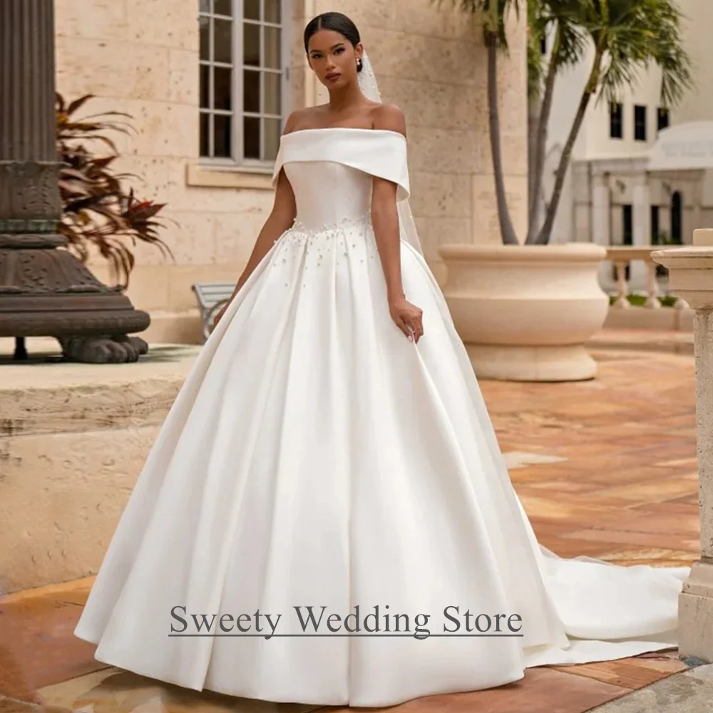 

Charming Ball Gown Satin Wedding Dress Customized Boat Neck Off Shoulder Pearls Sweep Train Bridal Dresses Vestido Noiva