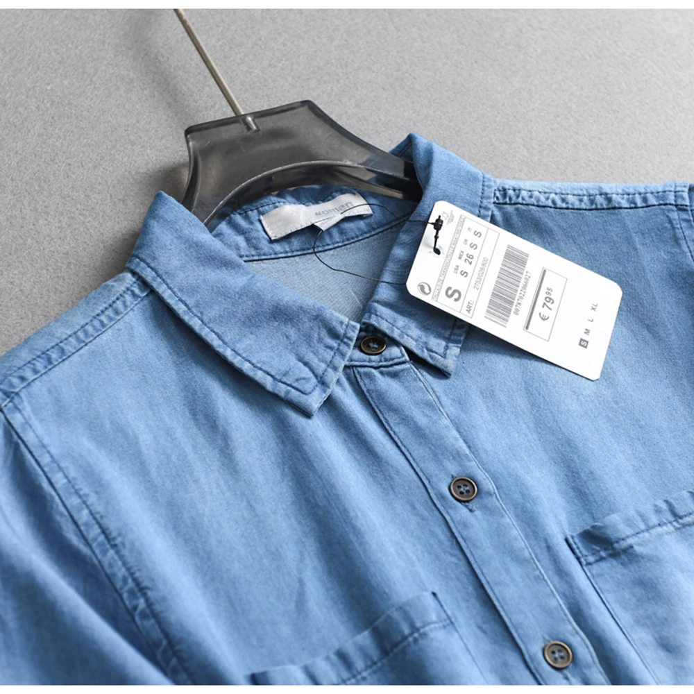 ชุดเดรสยีนส์สีทึบลําลองผู้หญิงกระดุมแถวเดียวออกแบบกระเป๋าสมมาตรสายรัดกระชับสัดส่วนชุดเสื้อเชิ้ตอเนกประสงค์