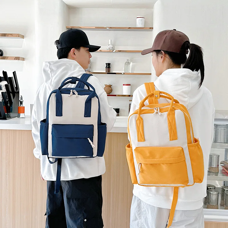 Compact nylon kindergarten schoolbag, cute color-matched patchwork children's waterproof hand-held double-shoulder backpack