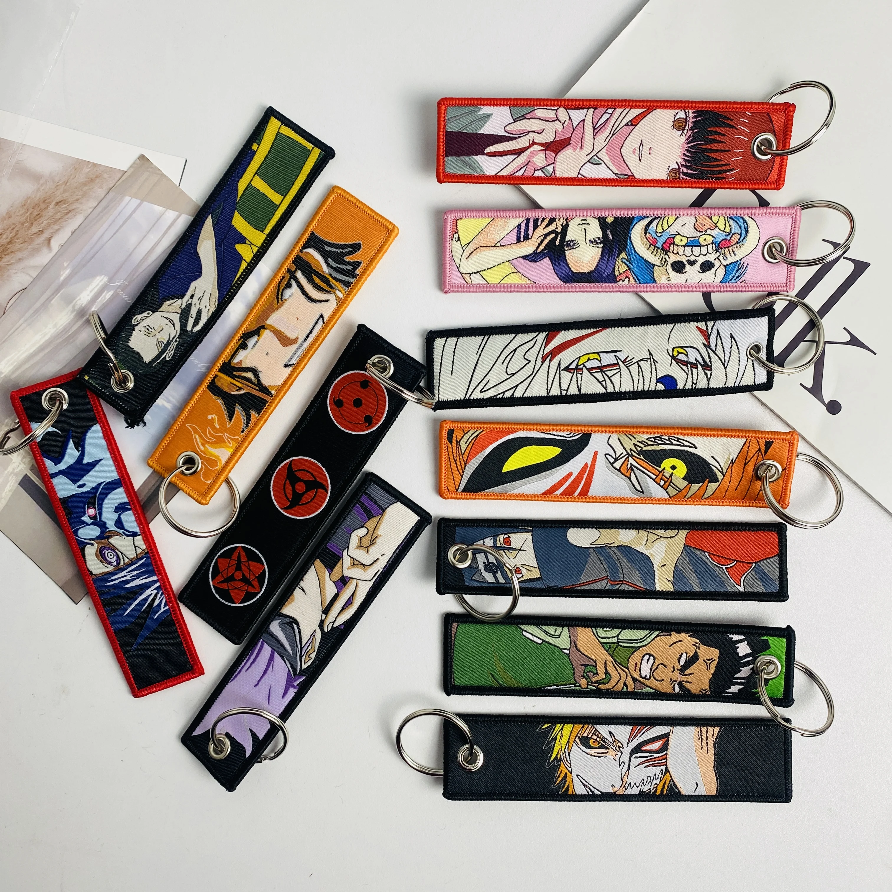 Wholesale Freeshipping Mix Anime Embroidered Keys Tag Keychains Jet Tag Women Keyring Car Keys Backpack Jewelry Accessories Gift
