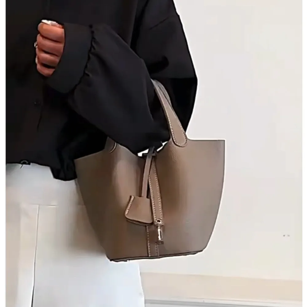 

Women's Beige Textured Bucket Bag with Inner Pouch, Top Handle & Drawstring Closure, Stylish Tote for Daily Use & Shopping