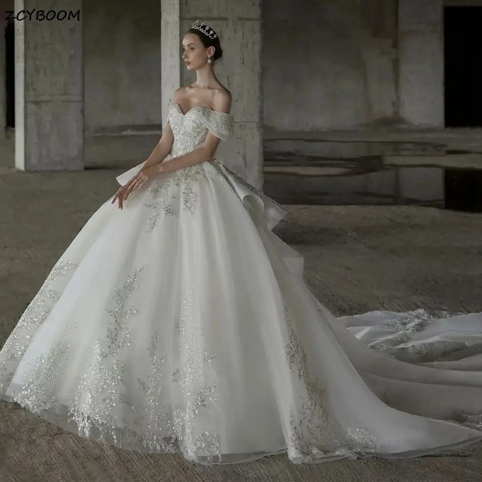 

Luxury Ivory Off Shoulder Ball Gown Wedding Dresses 2026 Sweetheart Lace Appliques Shiny Sequined Bride Gowns Vestidos De Novia