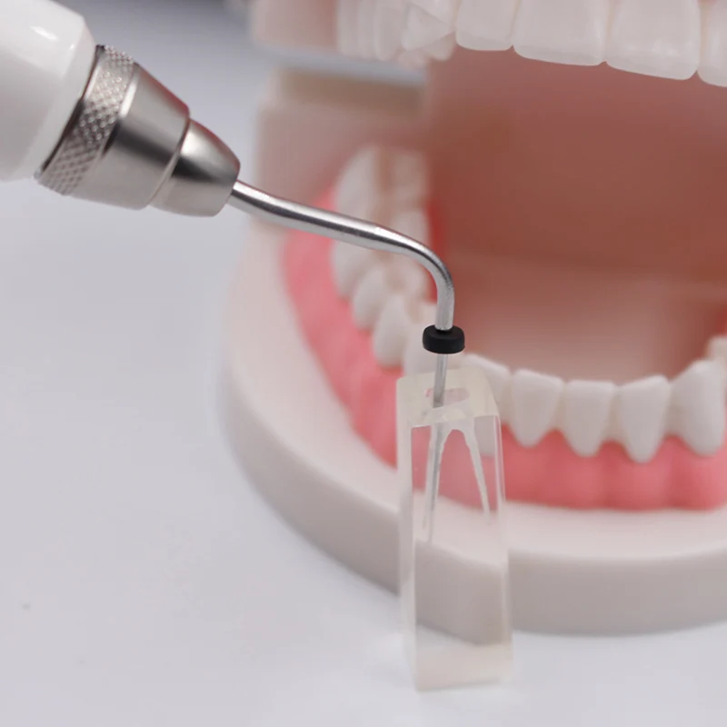 Gutta Percha Endodontyczny kanał korzeniowy Dental Gutta-percha Cutter Laboratorium dentystyczne Bezprzewodowy system napełniania piórem