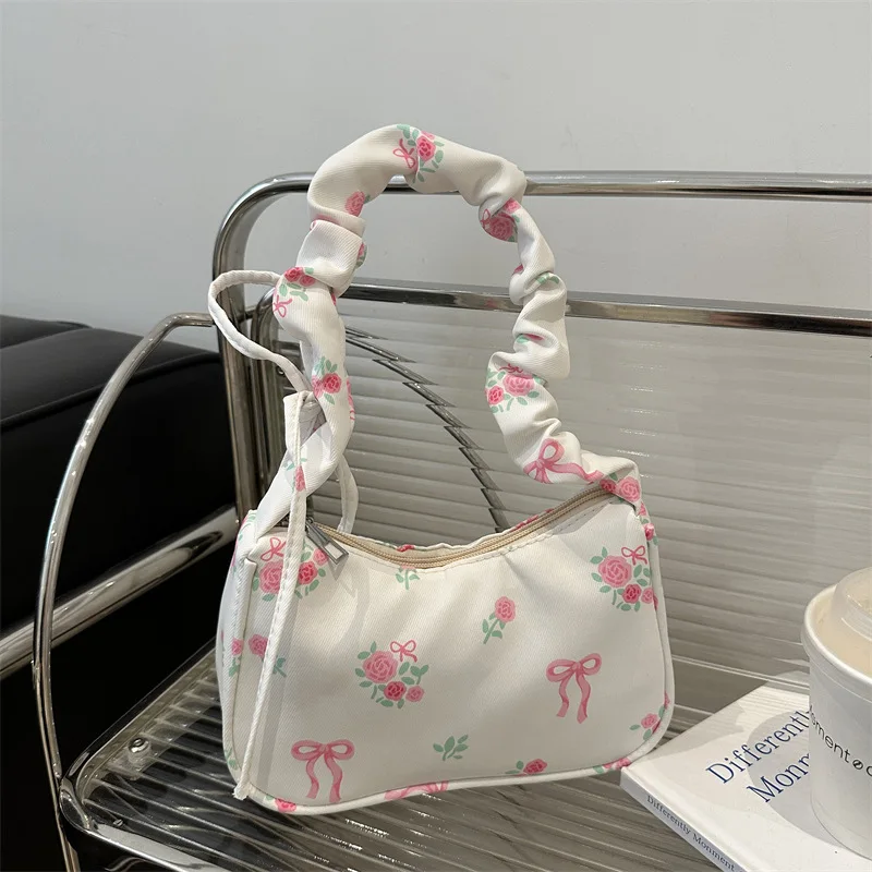 Bolso de mujer 2025, bolsos de lona plisados para verano, bolso para axila, bolso de mano con estampado de lazo Floral coreano, bolso de hombro pequeño para mujer