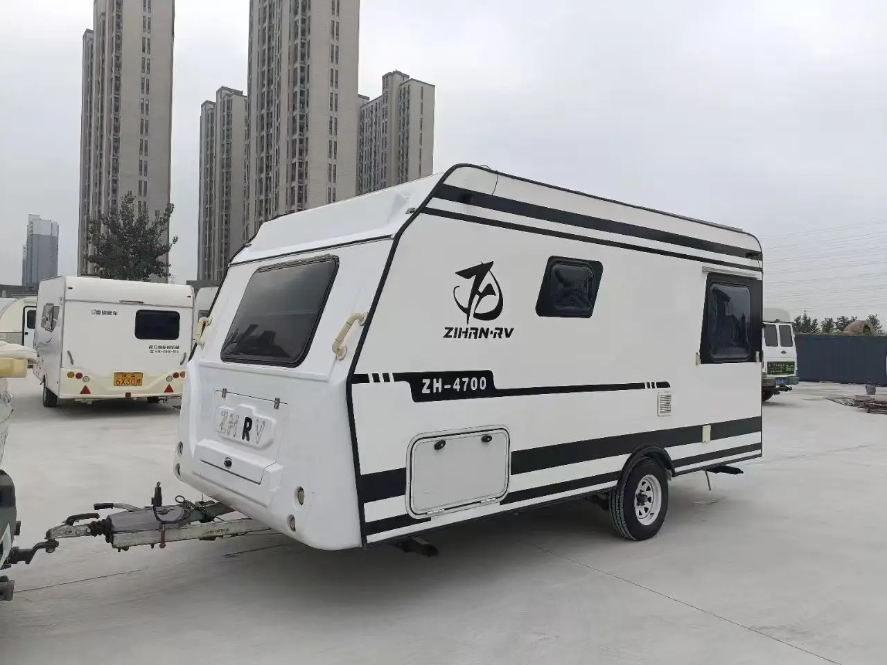 

Китайский люксовый внедорожный кемпер-прицеп для кемпинга с кухней и ванной комнатой