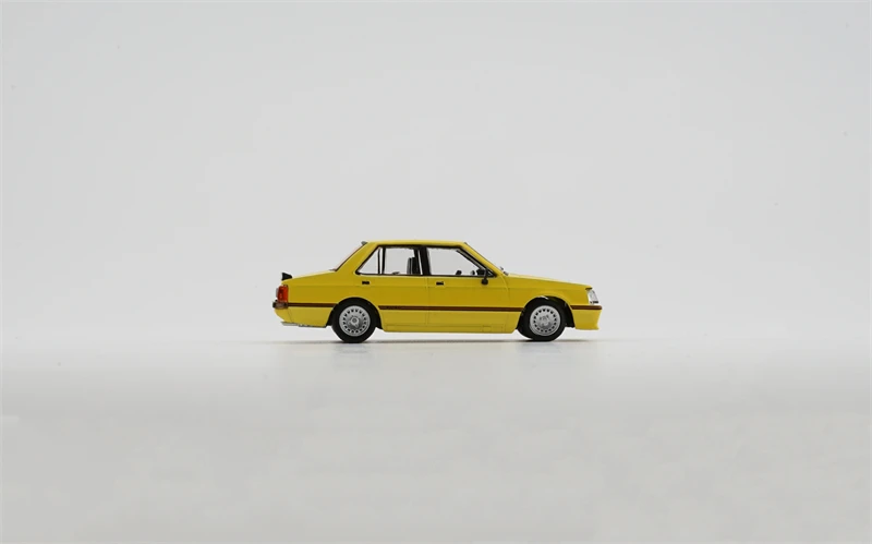BMC 1:64 Lancer EX2000 Turbo Yellow LHD Diecast Model Car