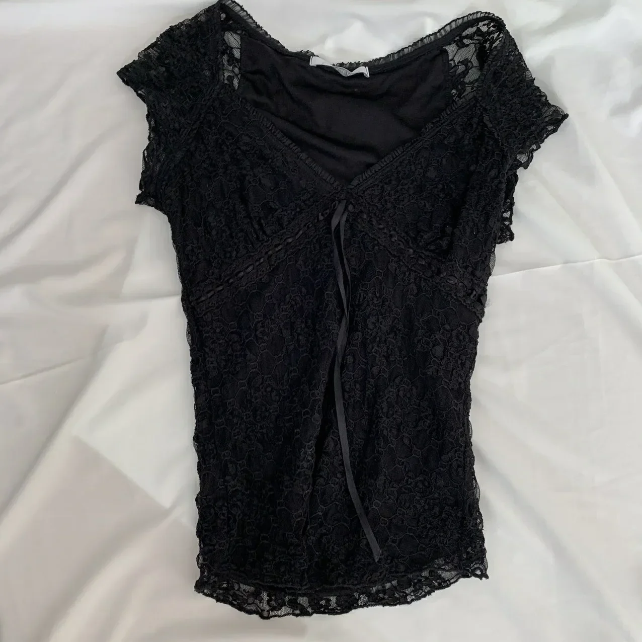 Camiseta de mujer Midriff-baring Tops ropa de verano estilo informal encaje malla empalme cuello en V amarre sin mangas camiseta ajustada ropa de calle