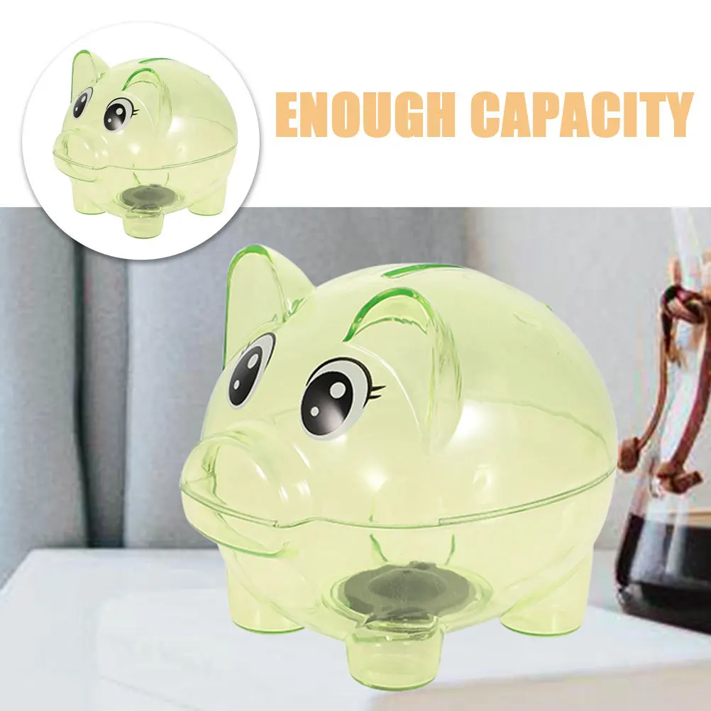クリエイティブな豚の形をした貯金箱 子供用の透明なコイン収納 プラスチック製の装飾品 プラスチック製の貯金箱 透明な貯金箱