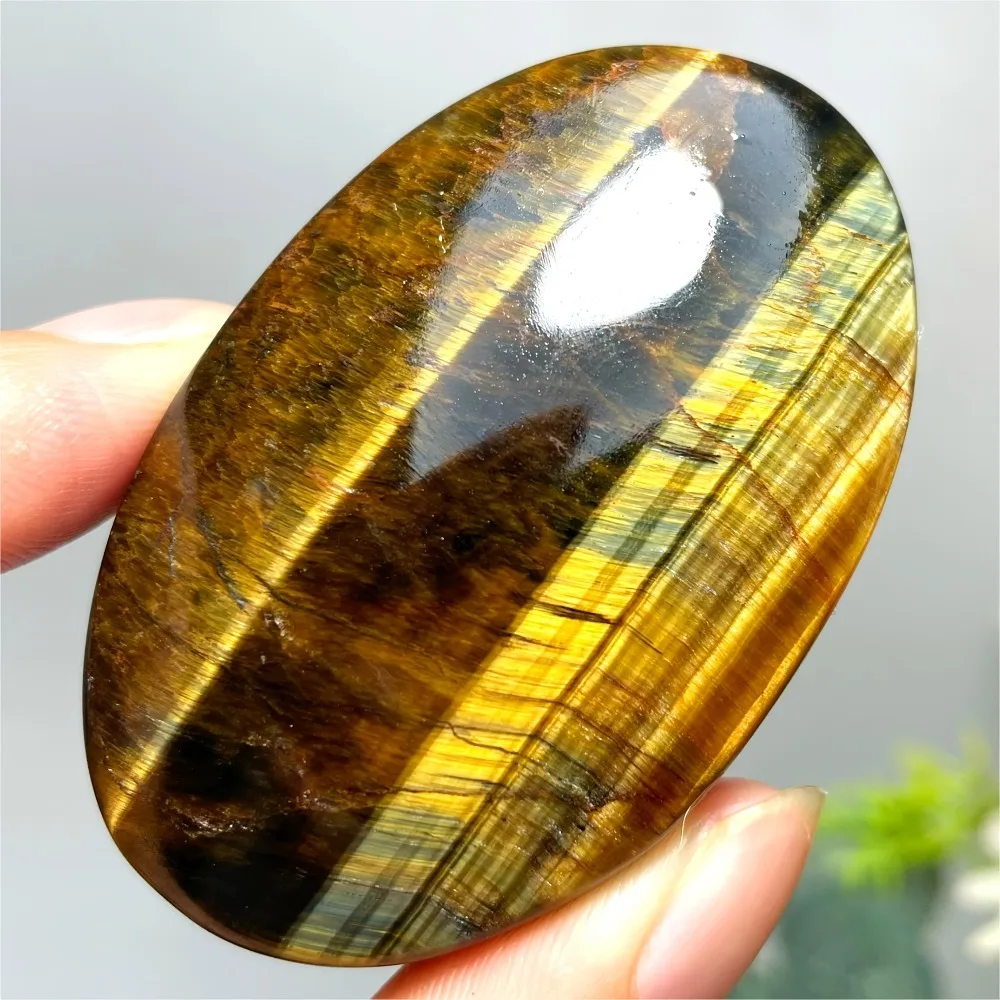 Palma de cristal Natural, ojo de tigre, piedra elíptica, azul profundo y rayas doradas, masaje de compresión, palma, Reiki, curación, preocupación, juguete para la yema del dedo