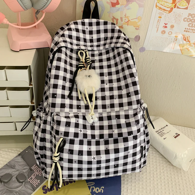 Korean-style plaid backpack for female middle and high school students, simple, versatile, fashionable, cute with stars, lightwe
