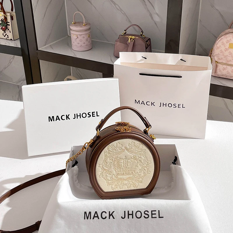 

Элегантная винтажная маленькая круглая сумка, легкая роскошная сумочка и круглая сумка через плечо.