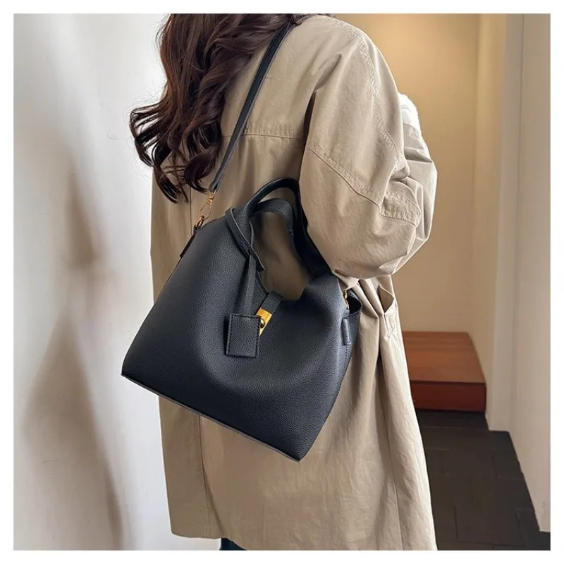 

2026 Spring New Women's Bucket Style Shoulder Bag in PU Leather with Lock Fastening for Work and Weekend
