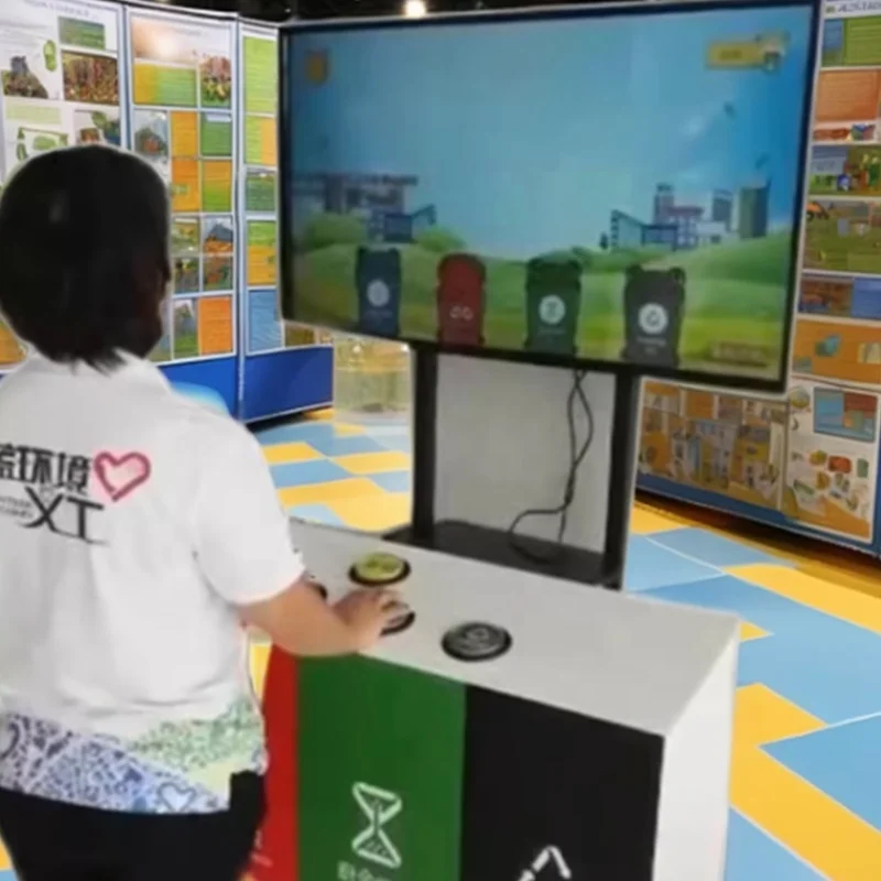 تصنيف القمامة، تعميم العلوم، لعبة تفاعلية، معرض علمي، ألعاب علمية، ألعاب تفاعلية