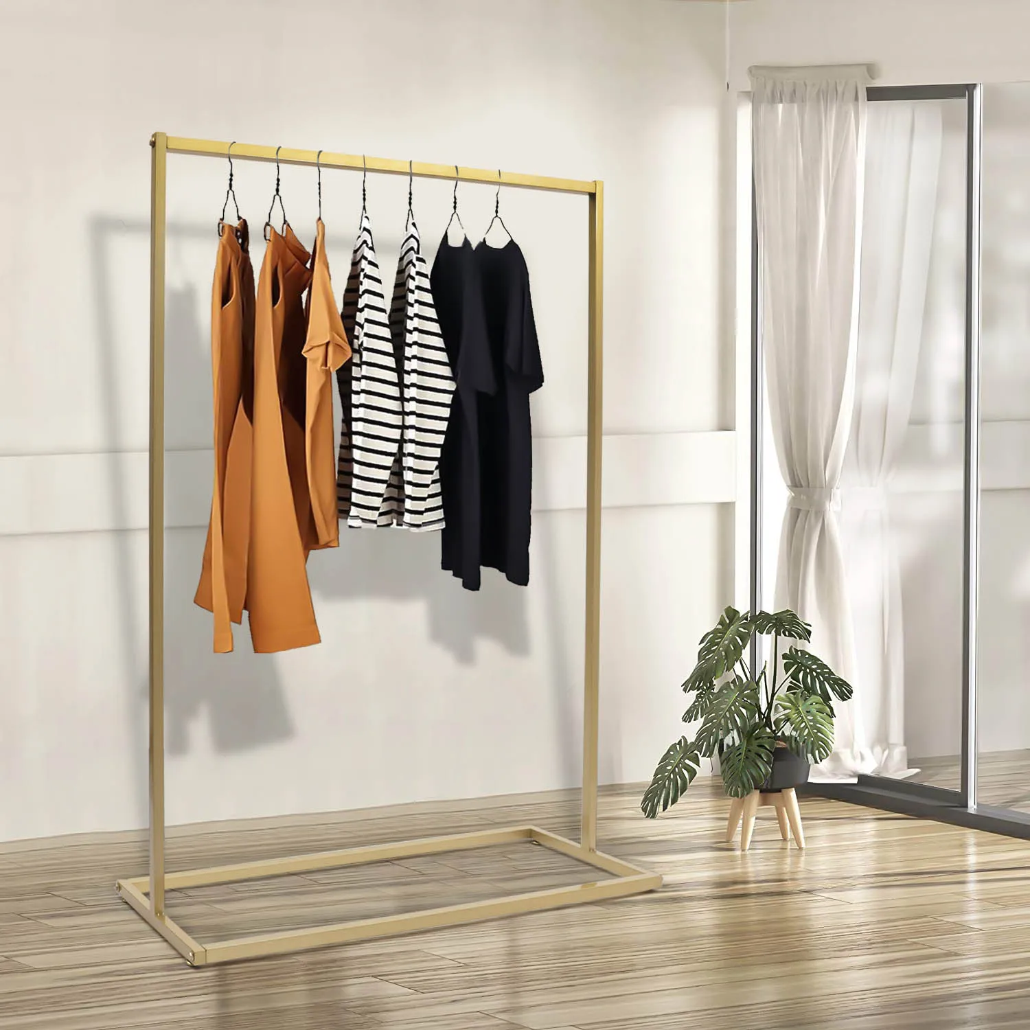 

Elegant Gold-Finished Clothes Rack: Sturdy, Stylish Organizer for Bedroom or Store with High Load Capacity