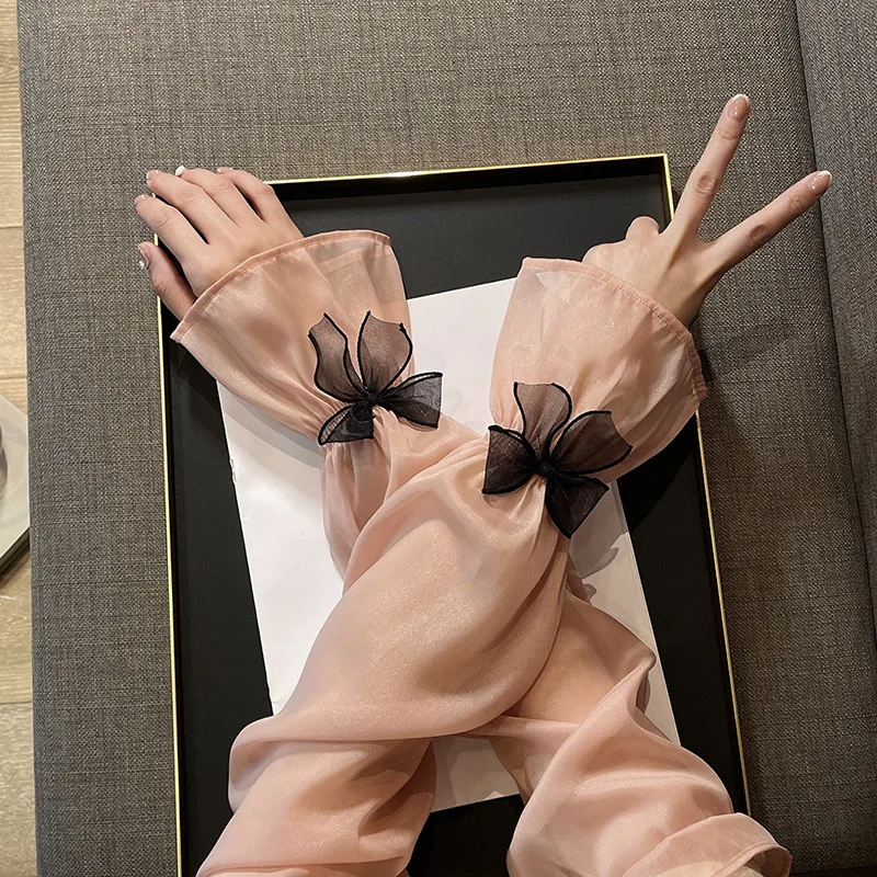 Mangas de protección solar transpirables de nailon y seda de hielo para mujer, guantes de encaje de malla con lazo fino y suelto, manga decorativa para fiesta de lujo británica