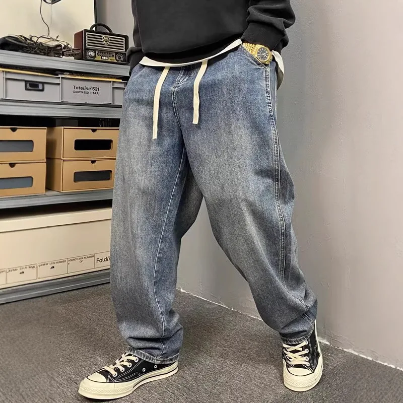 

Мужские джинсы в японском ретро-стиле: свободные брюки с эластичным поясом, средней посадкой, прямым кроем и зауженными штанинами