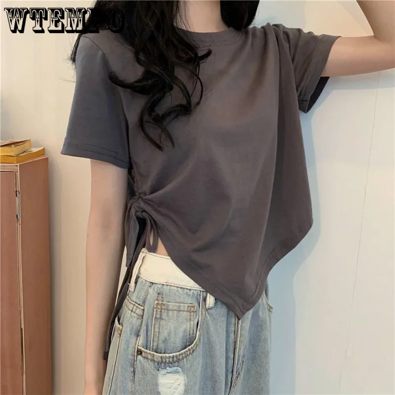 T-shirt manica corta tinta unita con colletto tondo ragazze Chic fasciatura irregolare Slim Crop top per donna 2022 estate tutto-fiammifero Casual