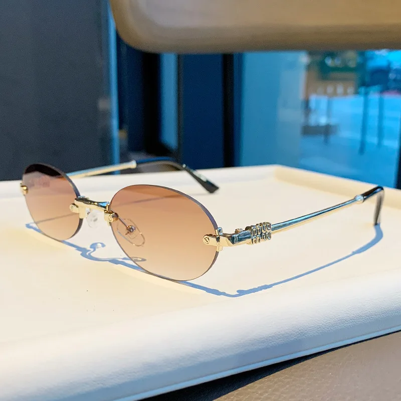 Light Luxury Rimless Oval Personalized Sunglasses, High-End Fashion Casual Sunglasses, Suitable For Outdoor Vacation Sunglasses view 6
