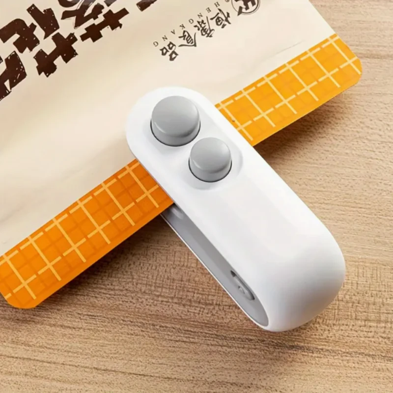

2-in-1 USB Rechargeable Mini Snack Bag Sealer & Cutter - 300mAh Lithium Battery, 16W Compact Design for Long-Lasting Freshness,