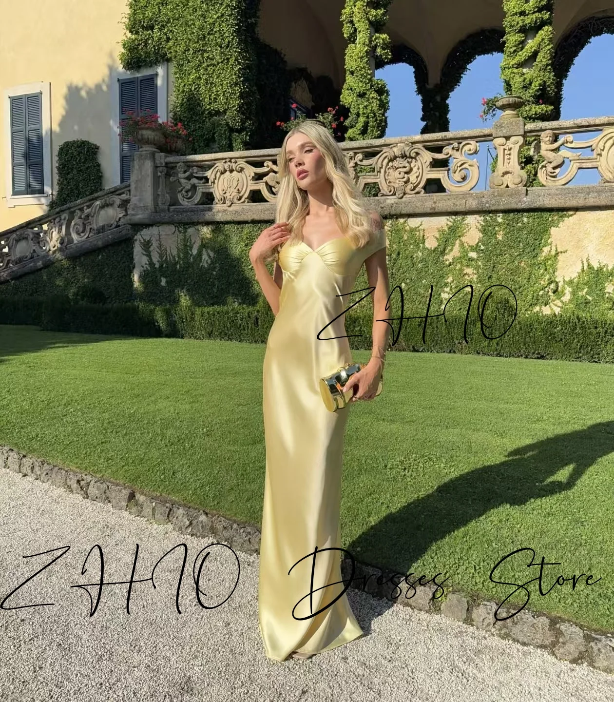ชุดราตรีงานแต่งงานสีเหลืองหรูหรา ทรงเมอร์เมด คอวี โชว์หลัง ผ้าซาติน ยาวกรอมพื้น สำหรับงานเลี้ยงหรืองานพิธีการ  สามารถสั่งตัดได้