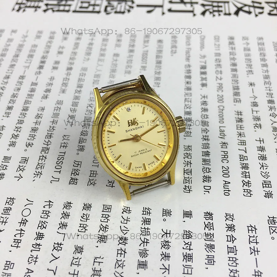 

Original stock, Shanghai brand oval strip fixed yellow surface manual mechanical women's watch, diameter 25mm free strap