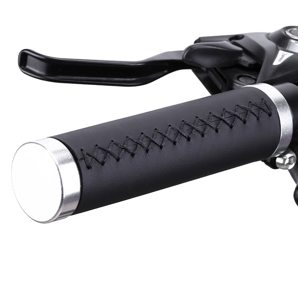

Sturdy PU Leather Bike Handlebar Grips Designed for Comfort and Stability Easy Installation with Double Lock System