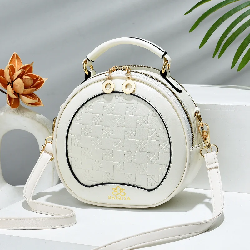 

Elegant Vintage Diaper Bag For Ladies: Minimalist Leather Shoulder Bag, Luxury Designer Tote With Solid Color, Large Capacity