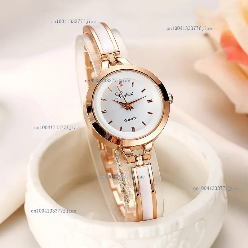 2024 Women Luxury Rose Gold Silver Bracelet Wristwatch Ladies Alloy Simple Casual Quartz Watches Clock