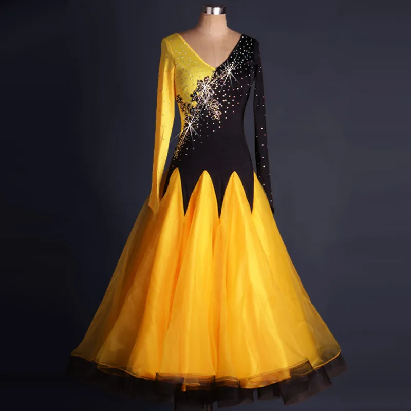 V‑neck long sleeve ballroom dance dress with color‑block splicing,rhinestone pattern and pointed full skirt,suitable for dance c