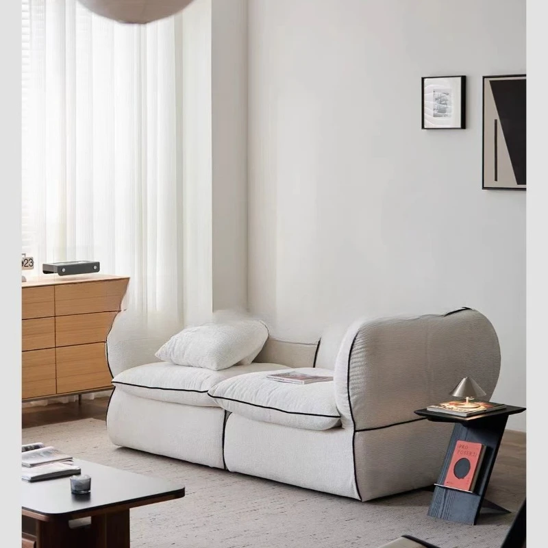 

French cream style niche minimalist white cloud sofa wabi sandy wind niche design elegant black hemming fabric sofa