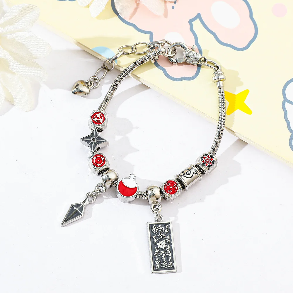 1pc Japanese anime Uchiha family dart pendant alloy bead oil drip bracelet party small gift