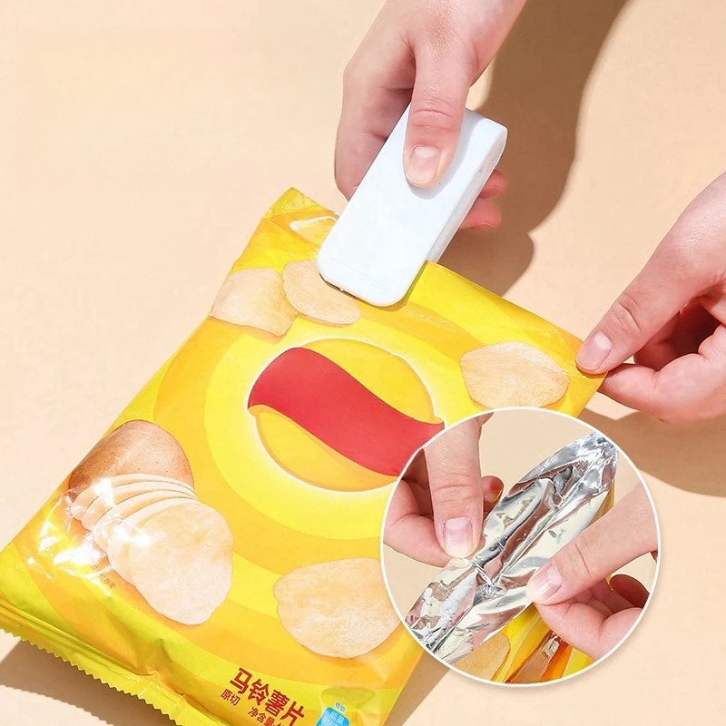 Portable bag heat sealing machine plastic packaging storage bag pink mini home sealing clip food leisure preservation small tool