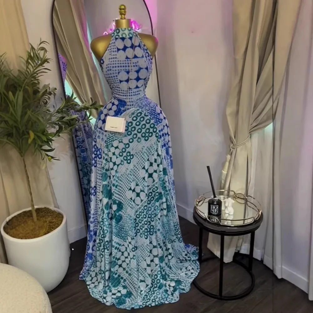 

Женское летнее платье 2026: без рукавов, с принтом, элегантное, с поясом, расклешенное, длинное, для отпуска.