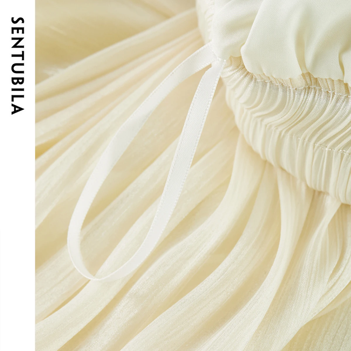 SENTUBILA النساء المشمش التنانير الطويلة 2025 السببية الرباط الخصر سوينغ هيم أنيقة ألف خط طيات التنانير ملابس الصيف W52QA1636