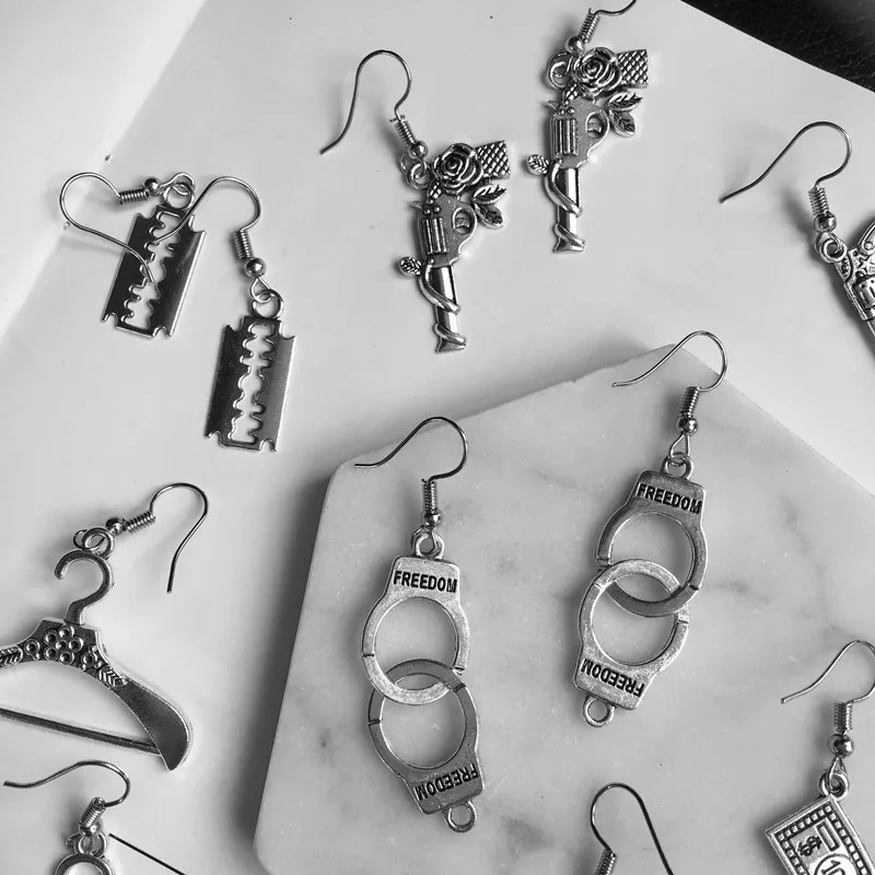 WKOUD Punk Cheap Sliver Handcuffs Blade Gun Drop Earrings Creativity Jewelry Accessories Women Simple Cool Wholesale Pistols