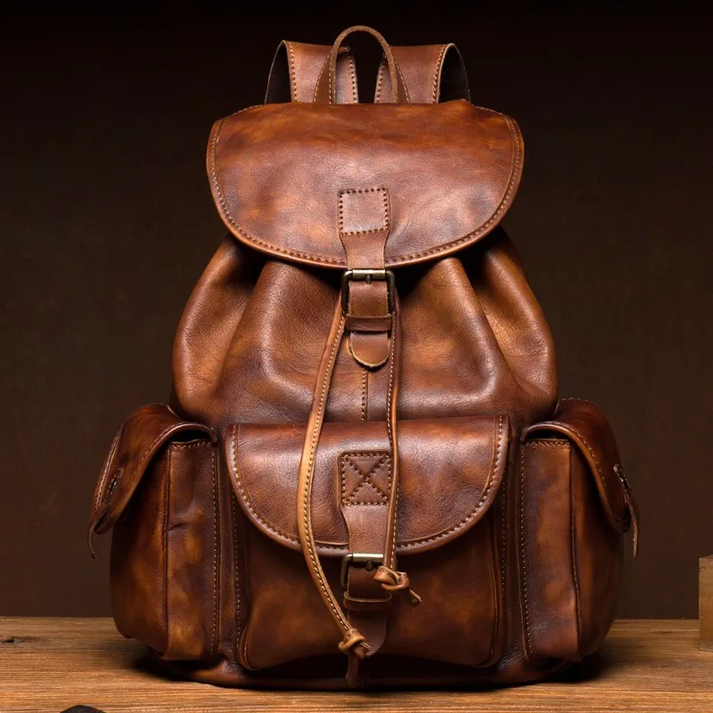 

Hand-tanned cowhide backpack casual men's leather backpack travel Baotou layer cowhide commuter computer backpack