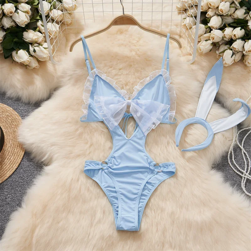 Mono sin mangas con cuello Halter para mujer, mono Sexy con contraste en blanco y negro de vaca, lencería erótica sin espalda con cordones huecos