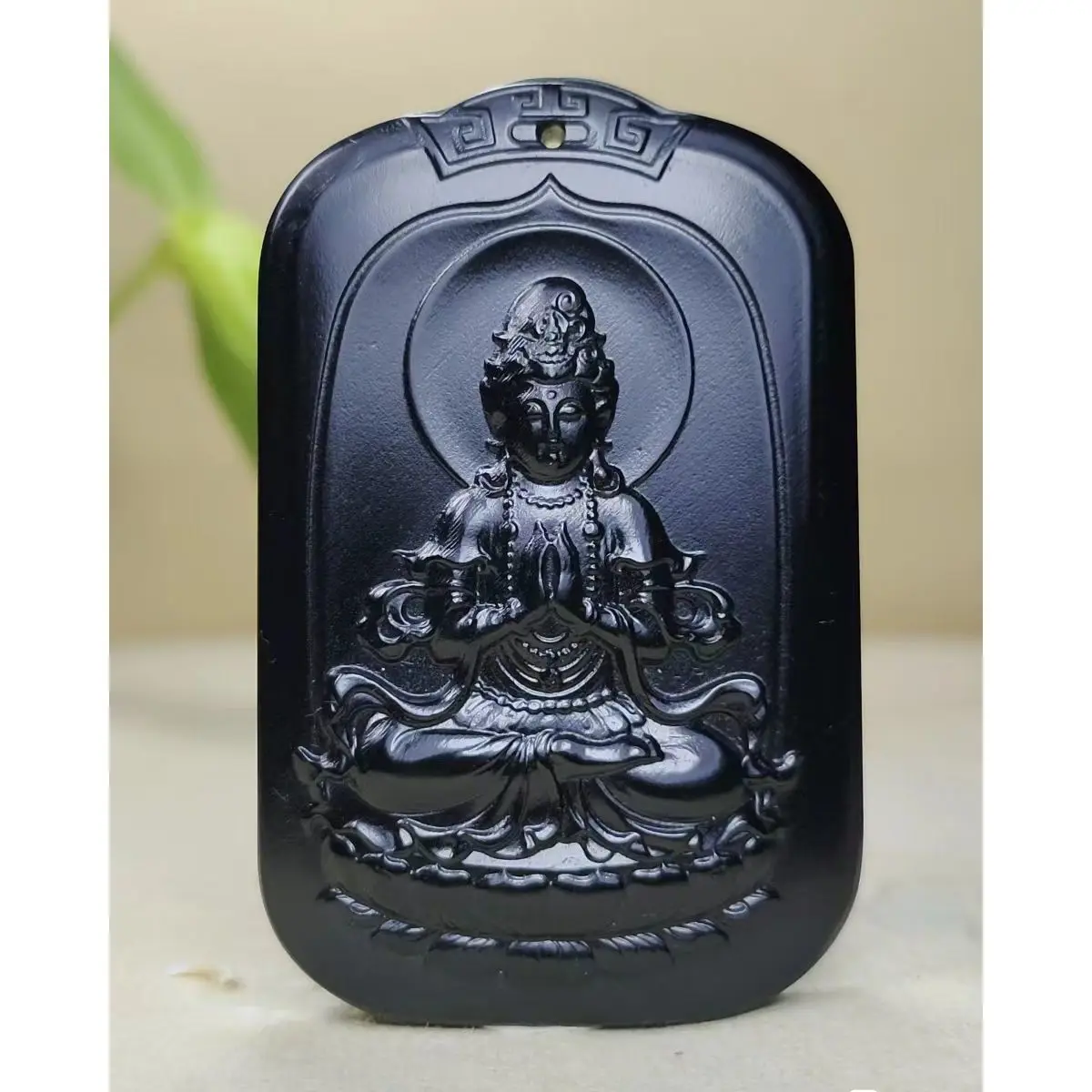

Xinjiang Hetian Jade Moyu [Sitting Lotus Guanyin] Jade brand, size 62 * 40 * 9MM