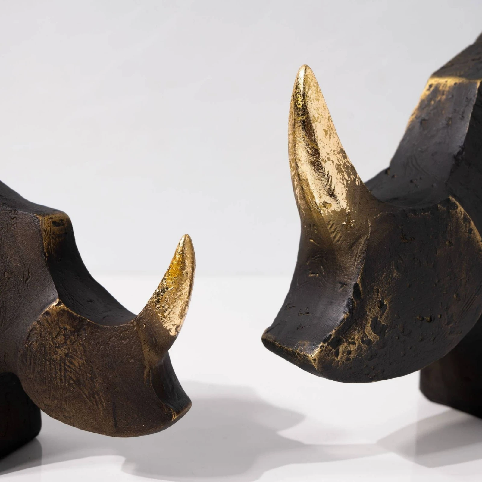 Rhino Sculpture Bronze Rhino Statue Sculpture with Gold Tusk Abstract Rhinoceros Figurine Faceted for Art Collectors, Tabletop