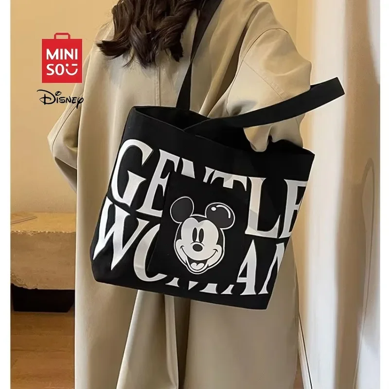 

MINISO Disney Large Capacity Mickey Mouse Canvas Bag Stylish Shoulder Crossbody Bag for Students Perfect for Class and Tutoring