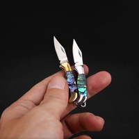 Mini portable color brass handle multi-functional outdoor tool key chain, a perfect unboxing tool for daily family use