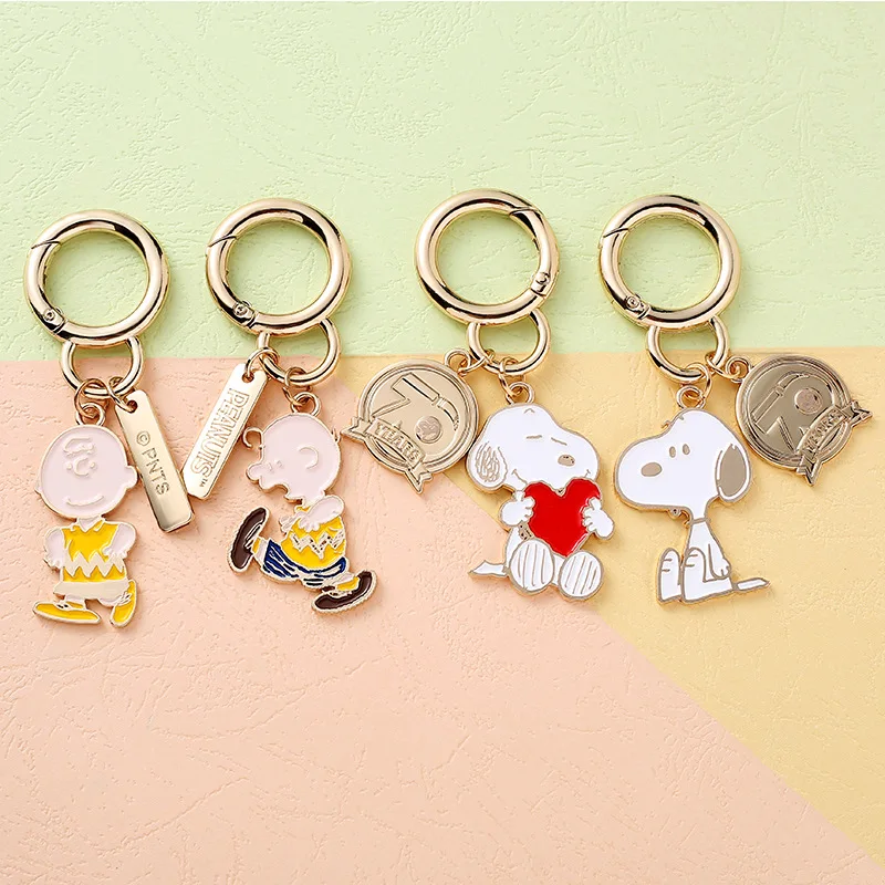 MINISO Snoopy anime metal keychain 70th anniversary new cartoon cute car keychain student school bag decoration pendant gift