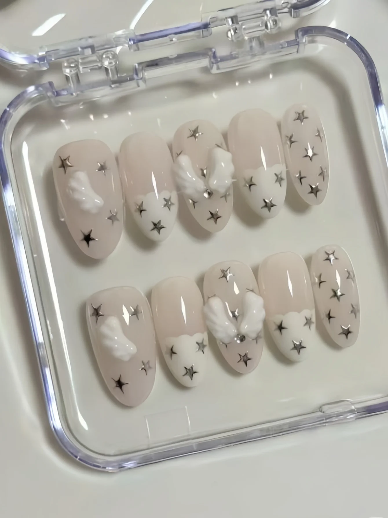 10-Piece Set of Cloud Wings and Silver Star Press-On Nails, Ice-Clear Nude Base Color, Clean and Transparent, Natural and Gentle