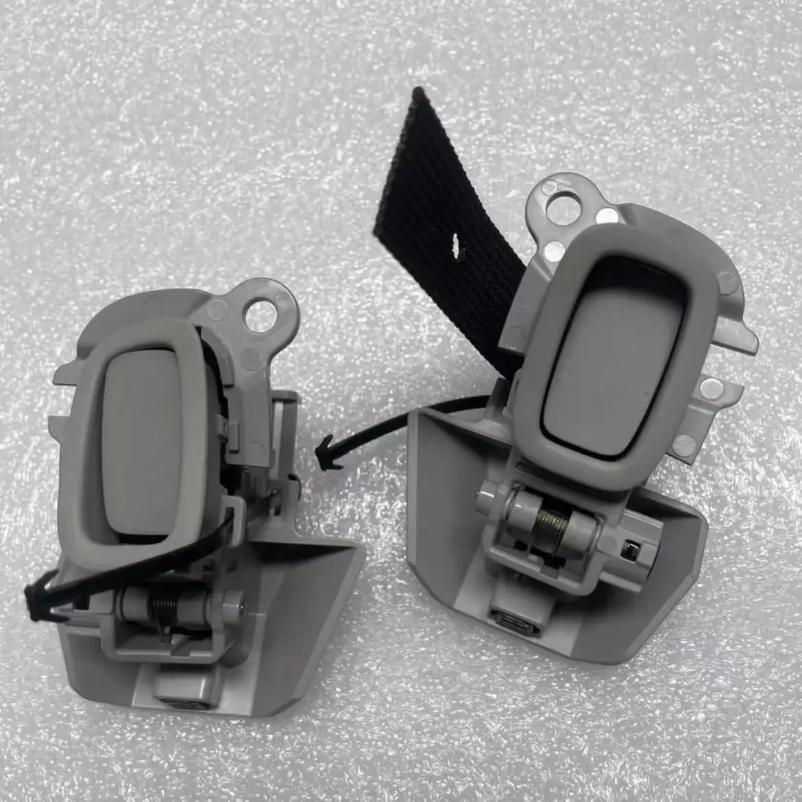 

Tesla Model 3 rear seats on the left and right sides of the hood hook accessories